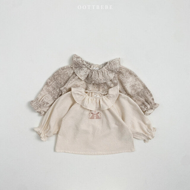 (Pre-order) OOTTBEBE - Madeleine Frill Blouse 마들렌프릴블라우스 (2 Colors)